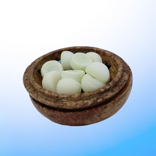 Load image into Gallery viewer, Image of brown dish displaying a bundle of frozen bottom drop suppositories for insertion into the gut exit opening of the digestive tract